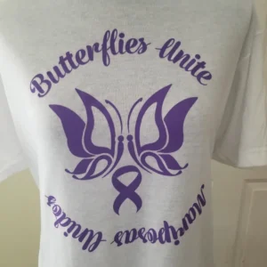 A white shirt with purple lettering and an image of a butterfly.