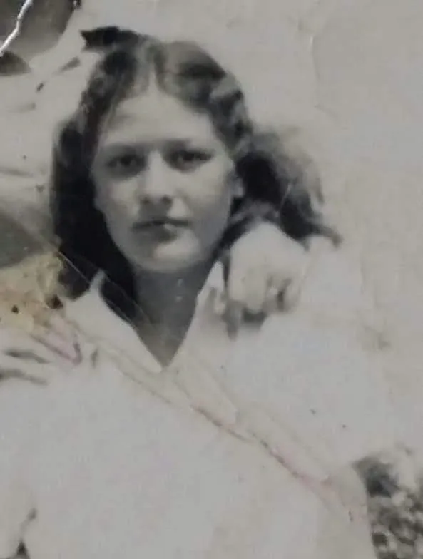 Black and white photo of a young woman.